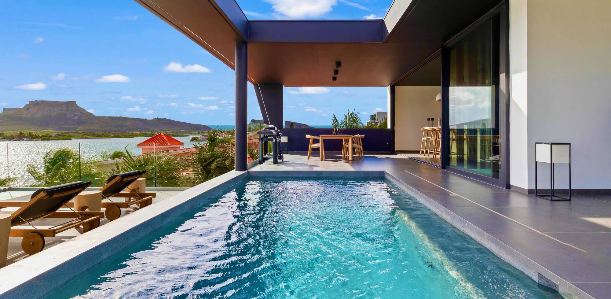 Luxury villa rooftop pool overlooking the sea