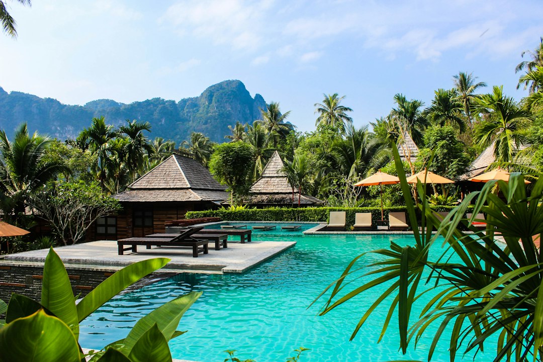 Luxury resort pool representing aspirational loyalty travel